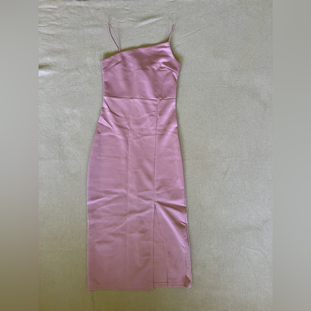 Brand new spaghetti strap x’s tight fitting dress.